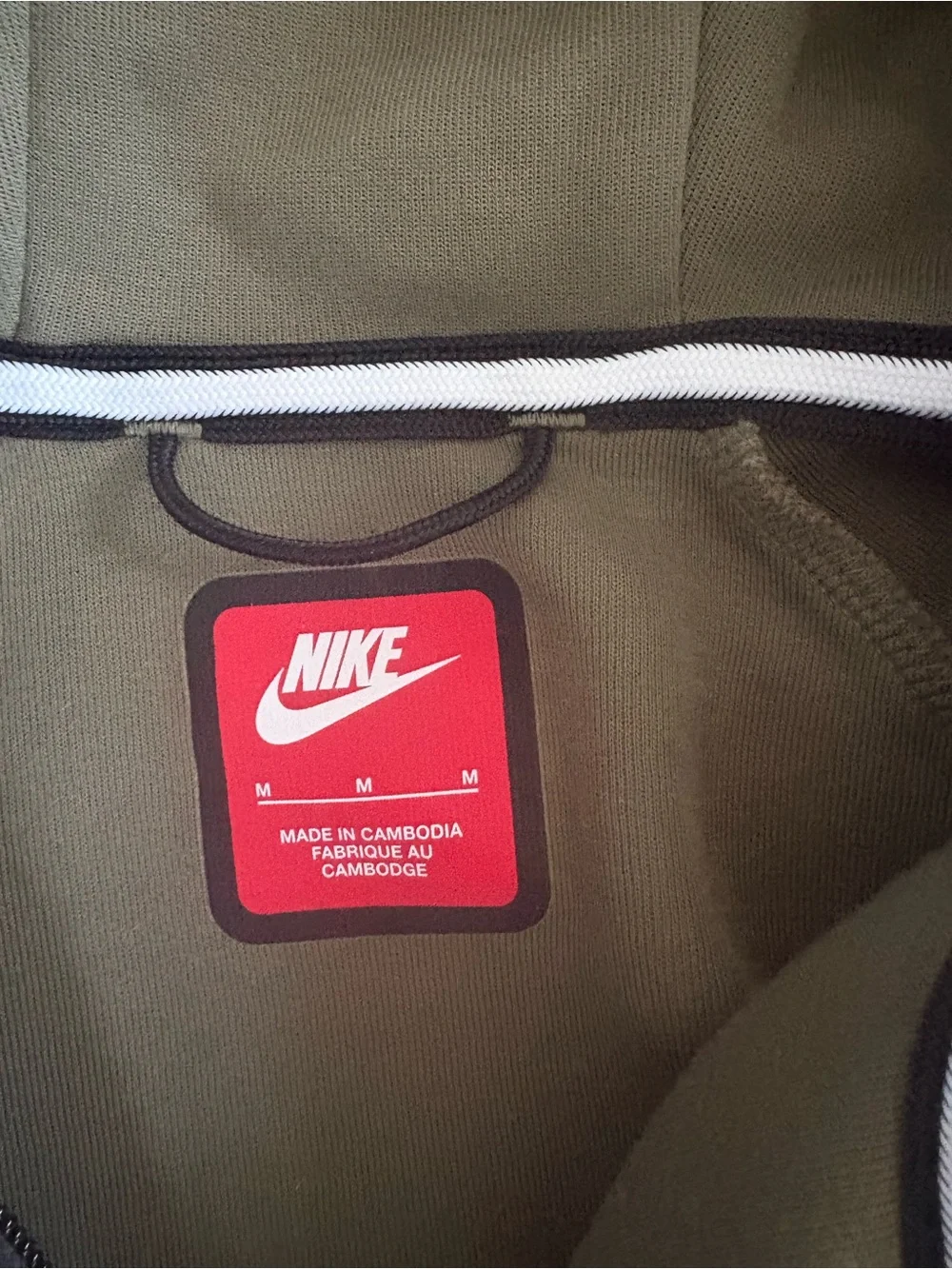 Kids Nike Tech hooded zip up.